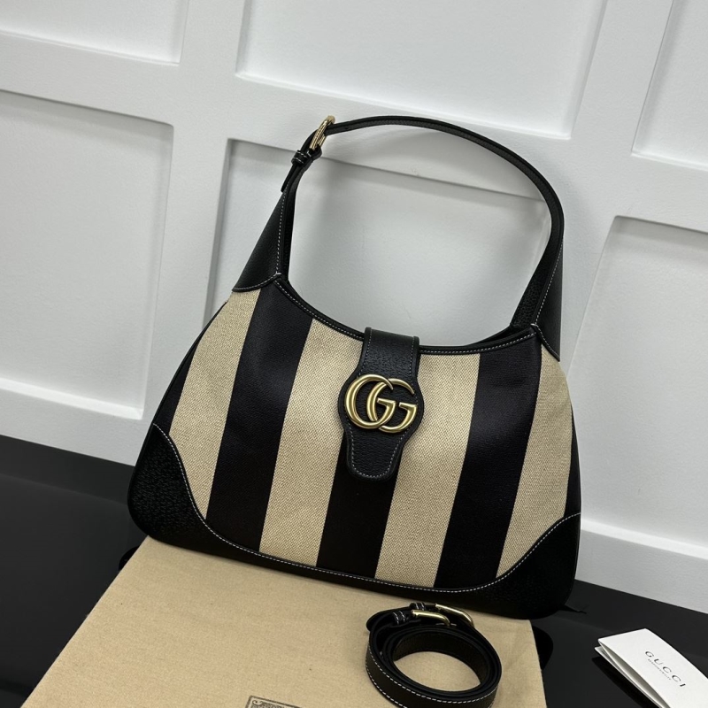 G*u*i top handle bags